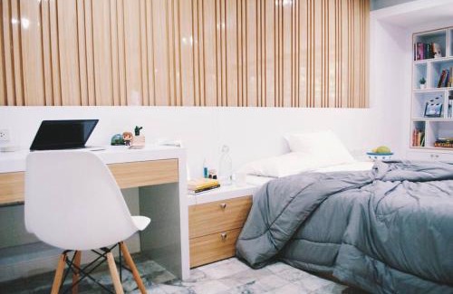 Din Daeng Apartment | Double Studio, Private Bath, Shared Kitchen with Local Family by Pillows & Purrs