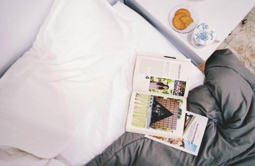 Din Daeng Apartment | Double Studio, Private Bath, Shared Kitchen with Local Family by Pillows & Purrs