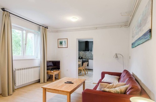 Most na Soci Apartment | Down floor ap with 1 bedroom, airco, tv, new kitchen and own lake side terrace