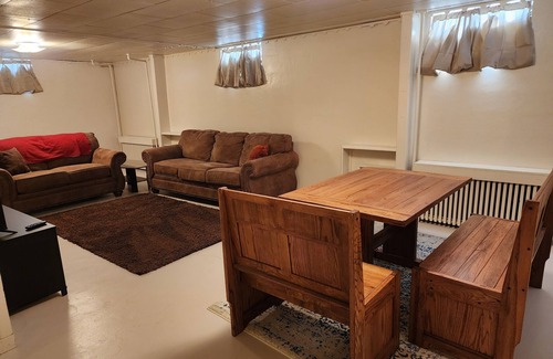 Craig Apartment | Downstairs apt, 2 beds, 3/4 bath, kitchen, washer/dryer. Walk to restaurants.