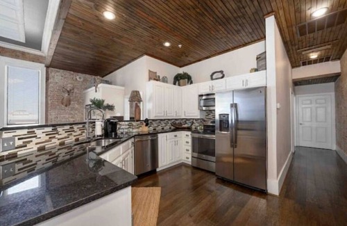 Denton Apartment | Downtown Apartment in Historic Scripture Building on the Square