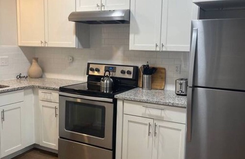 Cary Condo | Downtown Cary Comfort | 2 King Beds | 75 in TV