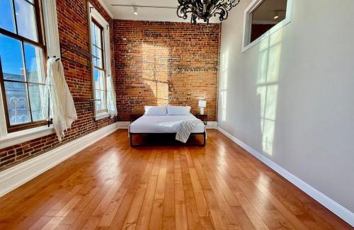 Cedar Falls Community Main Street Apartment | Downtown CF Retreat, King Beds, Brewery Below!