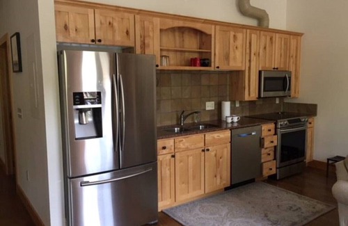 Estes Park Condo | Downtown Corner Luxury Loft on the Riverwalk - King Bed!