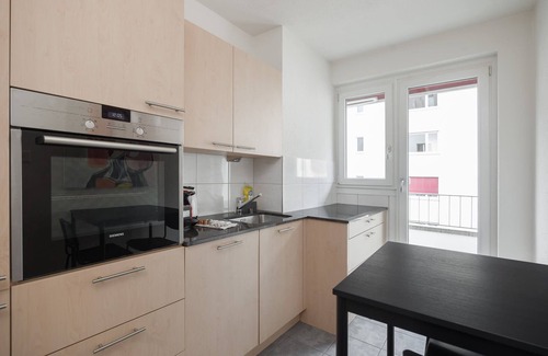Oerlikon Apartment | Downtown Dream: 3.5BR with Balcony and Style BA31