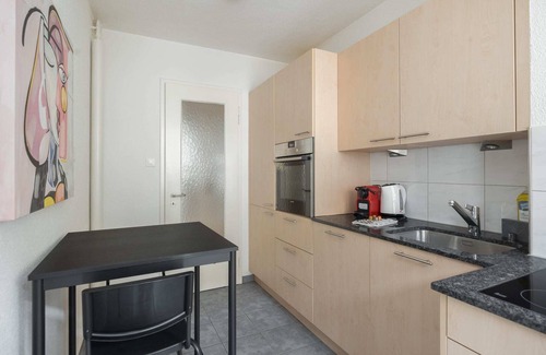 Oerlikon Apartment | Downtown Dream: 3.5BR with Balcony and Style BA31