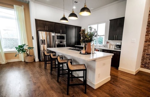 Northside House | Downtown Escape with Backyard, Gameroom and Hot Tub