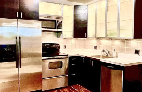 Grand Rapids Condo | Downtown GR - parking, fitness center, hot tub, rooftop pool deck included