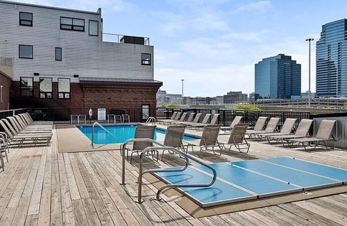 Grand Rapids Condo | Downtown GR - parking, fitness center, hot tub, rooftop pool deck included
