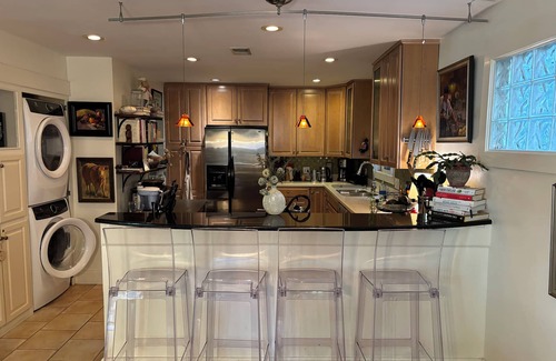 Harleston Village House | Downtown open space home with a European courtyard garden