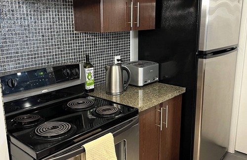Crosstown Apartment | Downtown Rogers Arena View: Free Parking and Pool with Sauna