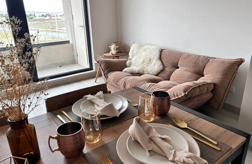 Puerto Natales Apartment | Dpto El Ovejero, ideal for a romantic getaway.