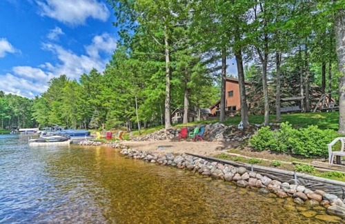 Gladwin Ski Chalet | Dream Cottage w/ Sandy Beach, Dock, Pontoon Rental