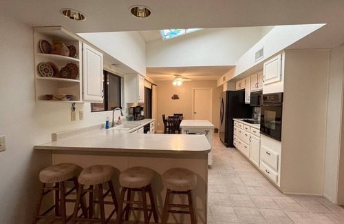 Sun City West House | DREAM RETREAT in Sun City West on a golf course with practice green.
