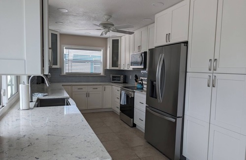 Saint James City House | Dream Vacation Pool and Waterfront Location
