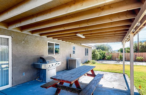 Desert Hot Springs House | Dreamy desert oasis with private yard, firepit, covered lanai, fireplace, & W/D