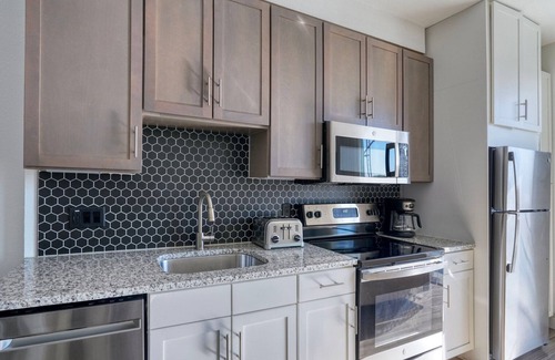 Waller Creek District Apartment | Dreamy Downtown 2BR w/Deck & Gym, nr Convention Center, by Blueground