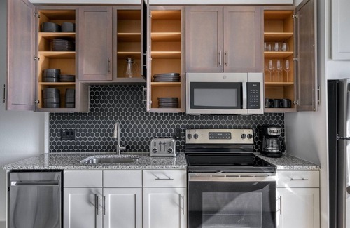 Waller Creek District Apartment | Dreamy Downtown 2BR w/Deck & Gym, nr Convention Center, by Blueground