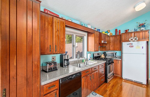 Beulah House | Dreamy escape on the water of Crystal Lake w/spacious deck & private dock