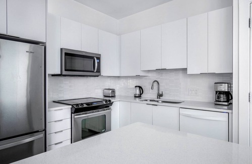 Chinatown Apartment | Dreamy Financial District 1BR w/W/D & Gym, nr Greenway, by Blueground