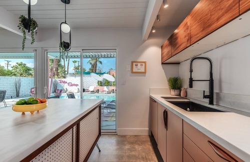 Racquet Club Estates House | Dreamy Mid Century Modern House with Saltwater Pool & Resort Style Backyard