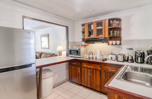 Damas Apartment | Dreamy tropical gem with pool, lush gardens, private patio, & WiFi