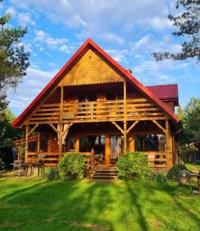 Januszkowo House | Drewniany dom z kominkiem, trasą S7 w 2h z Warszawy i Gdanska nad jezioro Mielno