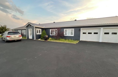 Gloucester County House | Drift into comfort at the Cozy Current. Your lakeside escape awaits you!