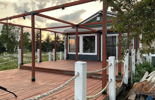 Gloucester County House | Drift into comfort at the Cozy Current. Your lakeside escape awaits you!