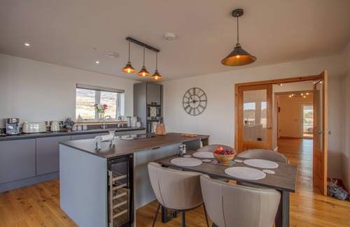 Aisgernis Cottage | DRIFTWOOD, pet friendly, with a garden in Eriskay, South Uist