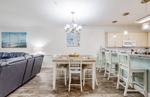 Central Myrtle Beach Condo | Dual-suite Magnolia Pointe condo with golf, pools, and screened patio