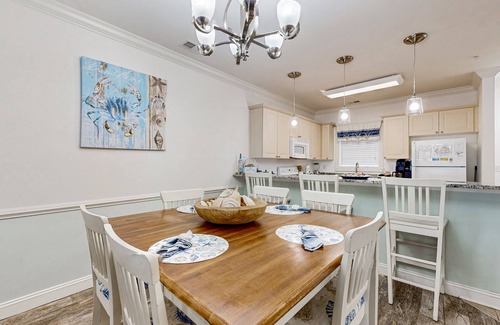 Central Myrtle Beach Condo | Dual-suite Magnolia Pointe condo with golf, pools, and screened patio