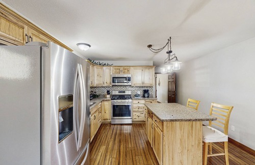 Rapid City House | Dual unit home with fenced yard, grill, firepit & jetted tub - close to town