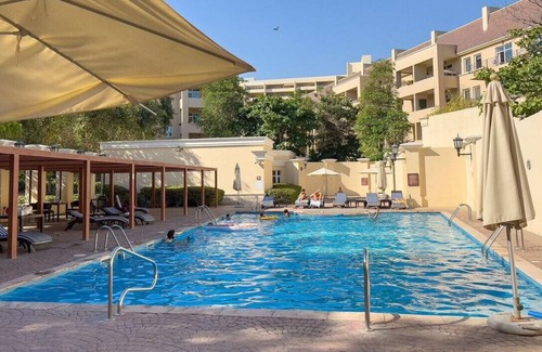 Motor City Apartment | Dubai Green Oasis Retreat