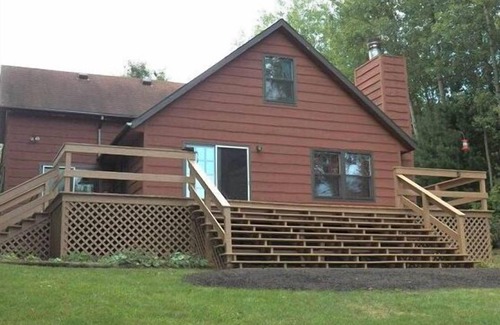 Ludington House | Duneview Lake House on a private and peaceful setting on Hamlin Lake