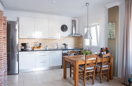 Bahia de Casares Apartment | Duplex apartment close to the beach, garden with great sea view and outdoor pool