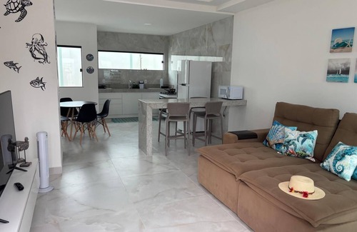 Taperapua Beach Apartment | Duplex apartment 5 minutes from Taperapuã beach and Barraca do Gaucho.