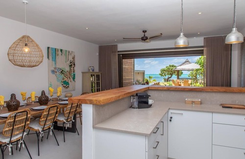 Roches Noires Apartment | Duplex apartments with direct access to an almost private beach