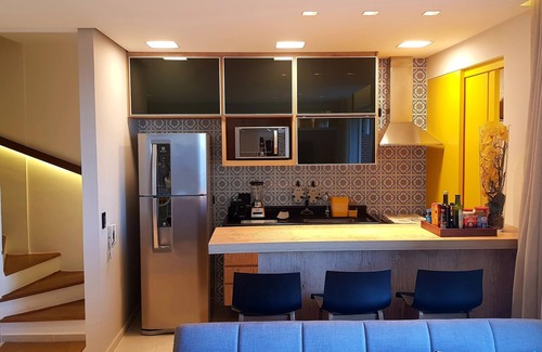 Peninsula Apartment | Duplex apartment with incredible sea views in a gated community in Guarujá.