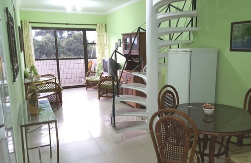 Boraceia Apartment | Duplex penthouse facing the sea / front of the saw, building in front of the sea