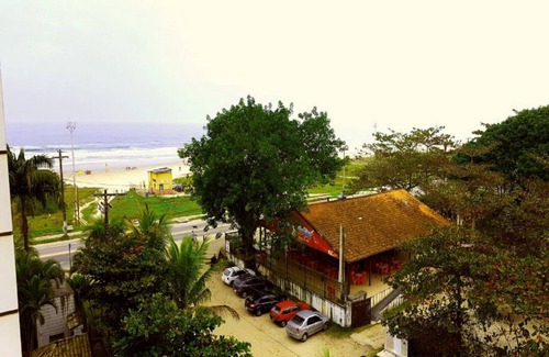 Boraceia Apartment | Duplex penthouse facing the sea / front of the saw, building in front of the sea