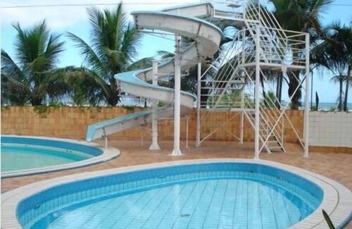 Boraceia Apartment | Duplex penthouse facing the sea / front of the saw, building in front of the sea