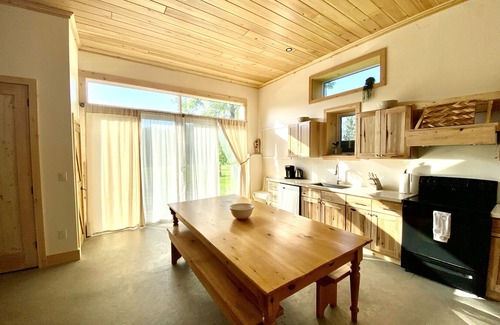 Britt Cottage | Duplex style cottage, 2 kitchens! Nestled in quaint area on River. Dock access!