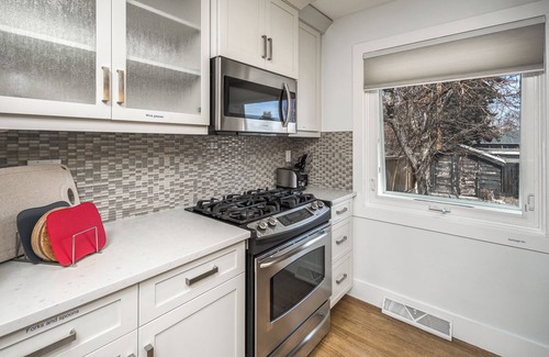 Southwest Calgary House | E@HOME Entire house 5BR2BA&Central by chinook mall