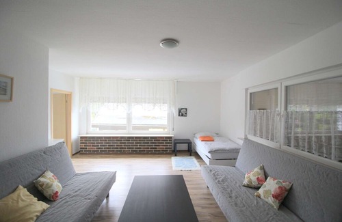 Eitorf Apartment | E06 Workers Apartment in a quiet location in Eitorf with a terrace with a seating area