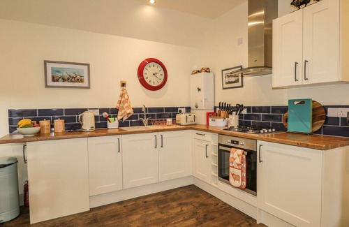 Glen Urquhart Cottage | EAST CRAIGDHU COW BYRE, with open fire in Beauly