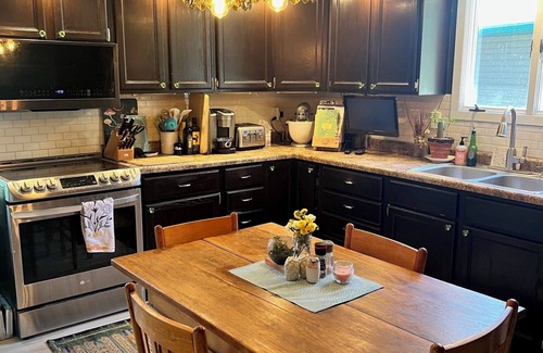 Sturgis House | Eclectic Rally retreat in the woods just minutes from legendary Main Street.