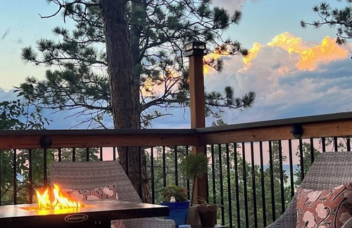 Sturgis House | Eclectic Rally retreat in the woods just minutes from legendary Main Street.