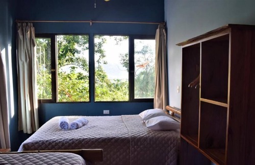 Turrialba House | eco bamboo house #2 surrounded by wildlife, gardens and waterfalls.