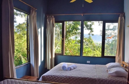 Turrialba House | eco bamboo house #2 surrounded by wildlife, gardens and waterfalls.